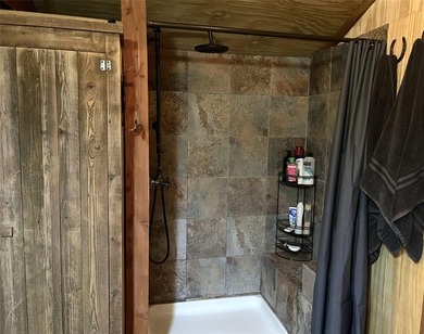 Experience true serenity on a heavily wooded 10.16 acres made - photo 19