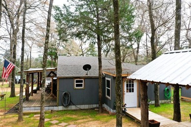 Experience true serenity on a heavily wooded 10.16 acres made - photo 31