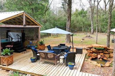 Experience true serenity on a heavily wooded 10.16 acres made - photo 32