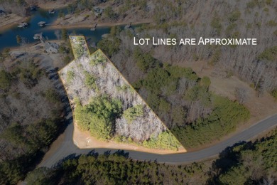 Desirable beautiful wooded level lot(2 acres) w/343' of water - photo 3