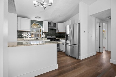NEW ROOF WITH FULL PRICE OFFER! This beautifully updated home - photo 2