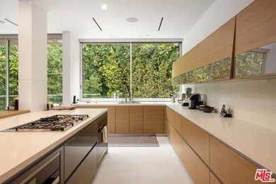 Perched on a secluded promontory above the Sunset Strip, this - photo 11