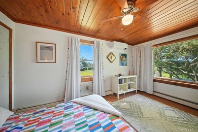 Set on 1.2 mostly-cleared acres in Lake Huntington, this updated - photo 11