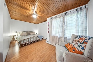 Set on 1.2 mostly-cleared acres in Lake Huntington, this updated - photo 12