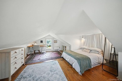 Set on 1.2 mostly-cleared acres in Lake Huntington, this updated - photo 13