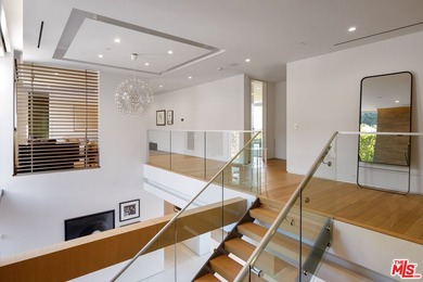 Perched on a secluded promontory above the Sunset Strip, this - photo 14
