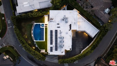 Perched on a secluded promontory above the Sunset Strip, this - photo 21