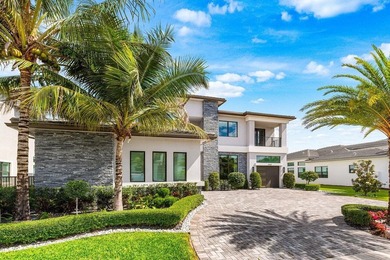 Located in the prestigious Boca Bridges community, this stunning - photo 4