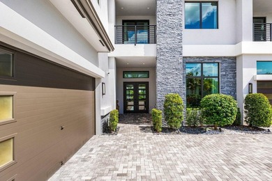 Located in the prestigious Boca Bridges community, this stunning - photo 5