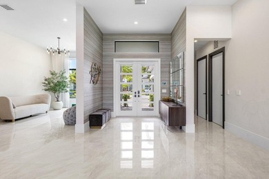 Located in the prestigious Boca Bridges community, this stunning - photo 6