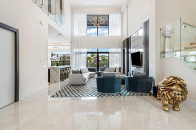 Located in the prestigious Boca Bridges community, this stunning - photo 8