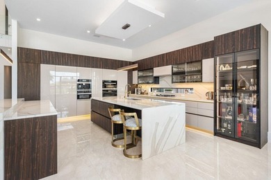 Located in the prestigious Boca Bridges community, this stunning - photo 10