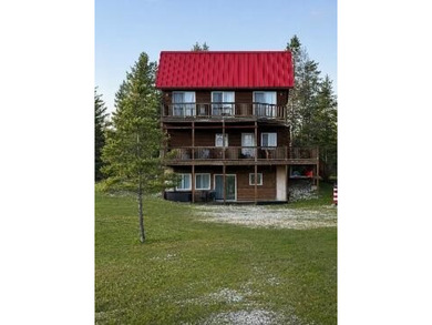 Escape to the peace and beauty of Bois Blanc Island with this - photo 1