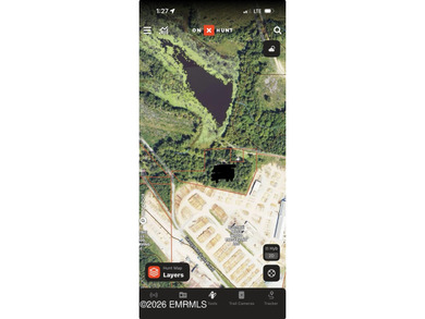 The perfect lot to build a camp or home on overlooking a lake - photo 2