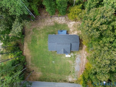 LOCATED ON A DOUBLE LOT, THIS 3 BEDROOM 2 BATH RANCH HOME IN - photo 2