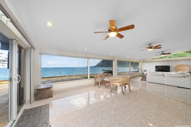 This beautifully appointed and spacious beach house is set in a - photo 2