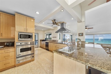 This beautifully appointed and spacious beach house is set in a - photo 5