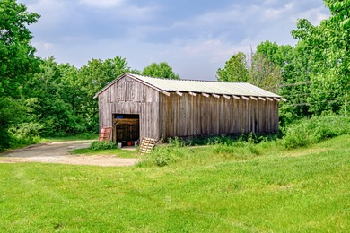 1 acre lot on prime rt 26 with 40 x 32 barn. Bring your vision! - photo 3
