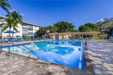 Lake Condo For Sale in Coconut Creek, Florida