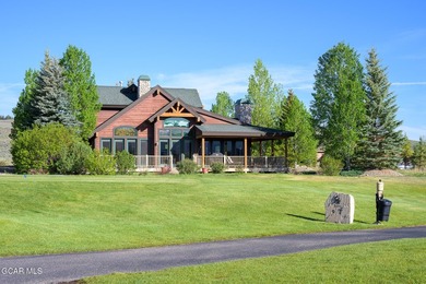 Perfectly positioned along the 9th tee box, this custom-built - photo 2