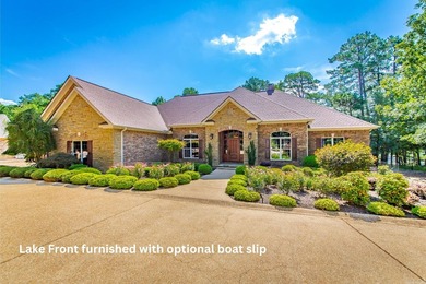 Experience the pinnacle of lakefront luxury in this furnished - photo 1