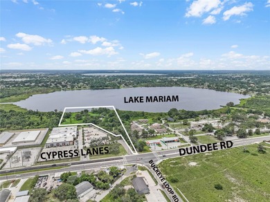 A Gorgeous 8.87 Acre Lakefront Parcel Zoned Mixed Use in the - photo 2