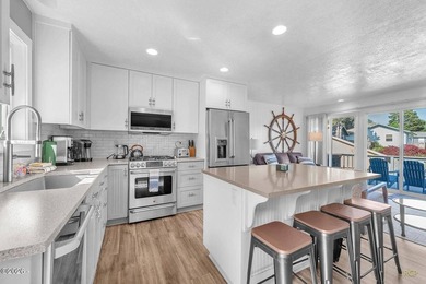 Lakefront living at its best. This fully furnished 2 bedroom, 2 - photo 3