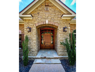 Experience the pinnacle of lakefront luxury in this furnished - photo 5