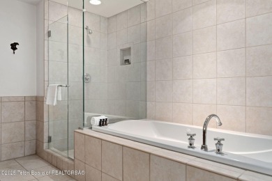 Discover an exceptional ski-in/ski-out penthouse in the heart of