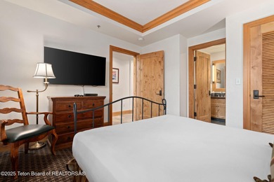 Discover an exceptional ski-in/ski-out penthouse in the heart of