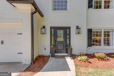 Beautifully updated brick-front home in a quiet cul-de-sac with - photo 3
