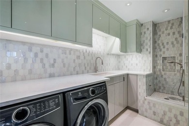 Experience the pinnacle of luxury living in this totally - photo 17