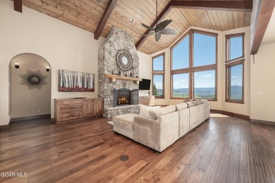 Set on three private acres in Pole Creek Timbers, this - photo 1