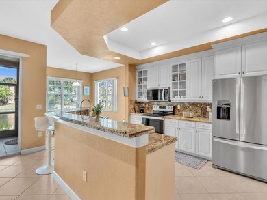 Nestled in the gated community of Heron Bay in Parkland, this - photo 17