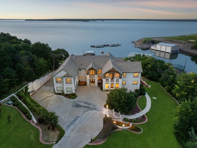 Experience elevated lakefront living in this extraordinary - photo 1