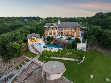 Experience elevated lakefront living in this extraordinary - photo 3