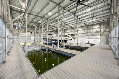 Experience elevated lakefront living in this extraordinary - photo 10