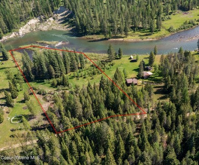 This exceptional 3.65-acre riverfront property features 405 feet - photo 1