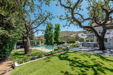 Situated along the prestigious North Ranch Golf Course, this - photo 50