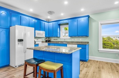 Designed for easy island living, this thoughtfully laid out 3 - photo 9