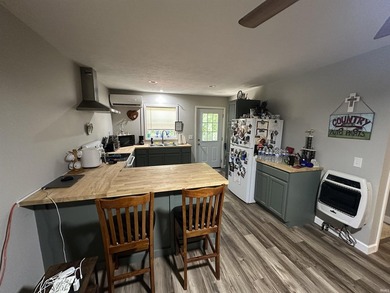 Enjoy the simplicity and convenience of this well-maintained - photo 10