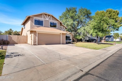 Located in a desirable Chandler neighborhood, this recently - photo 2