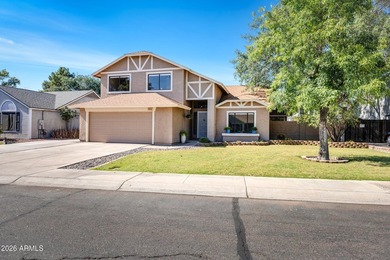 Located in a desirable Chandler neighborhood, this recently - photo 3