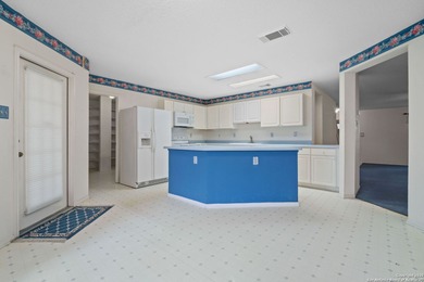 Set on a green belt within the Fairways of Woodlake gated