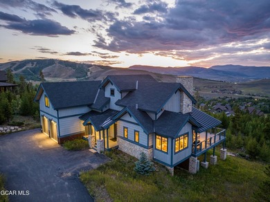 Experience the ultimate mountain lifestyle in this exceptional - photo 1
