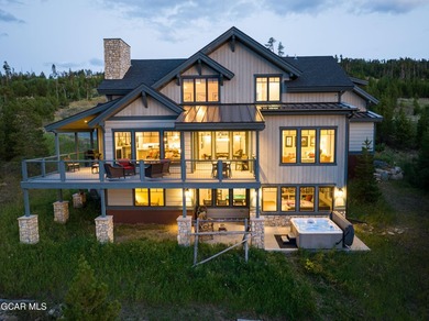 Experience the ultimate mountain lifestyle in this exceptional - photo 2