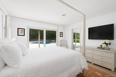 Tucked away on 1.4 acres of lush, landscaped grounds, this - photo 16