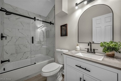 This charming bungalow-style home in the heart of Bay Village - photo 17