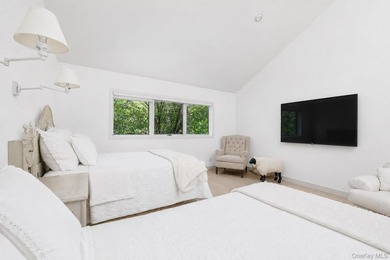 Tucked away on 1.4 acres of lush, landscaped grounds, this - photo 18