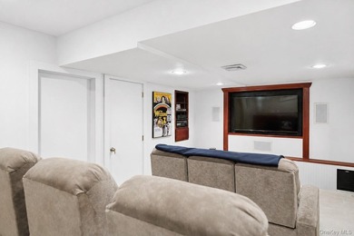 Tucked away on 1.4 acres of lush, landscaped grounds, this - photo 20